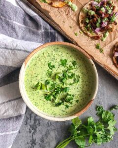 bowl of creamy green jalapeno cilantro salsa