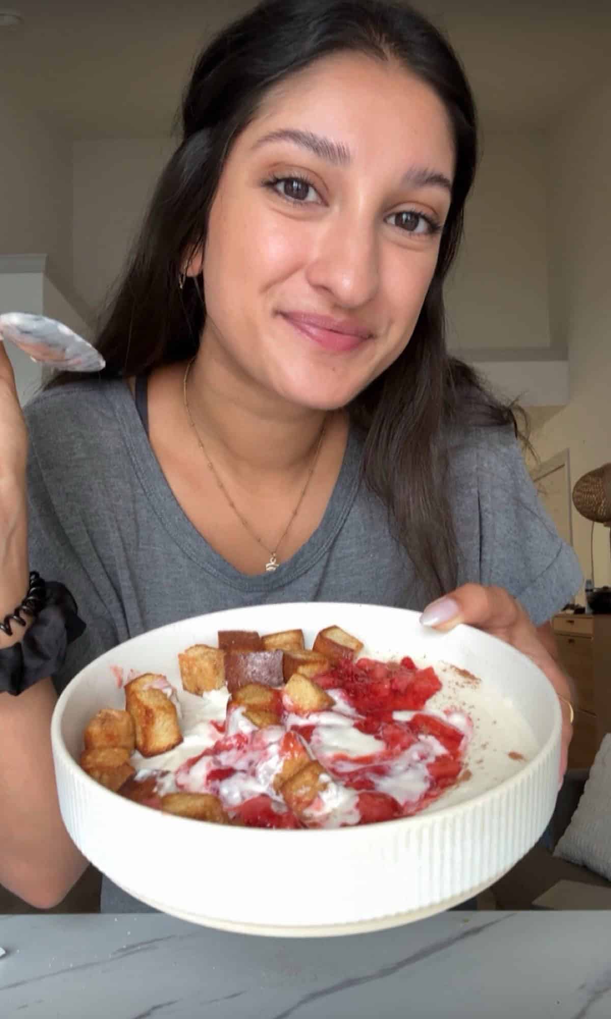 Strawberry Cheesecake Cottage Cheese Bowl with Cinnamon Toast Crunch 2 strawberry cheesecake cottage cheese bowl bite